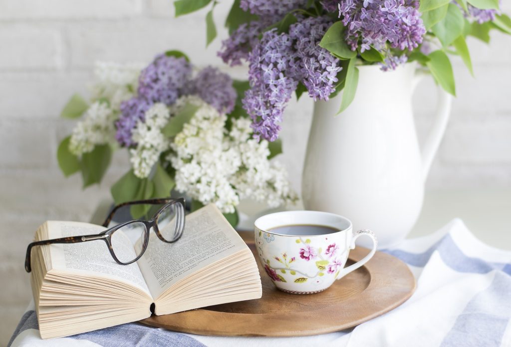 reading to unwind, bookl drink and flowers