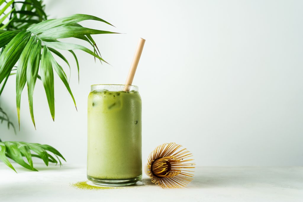 A glass drink of Matcha latte